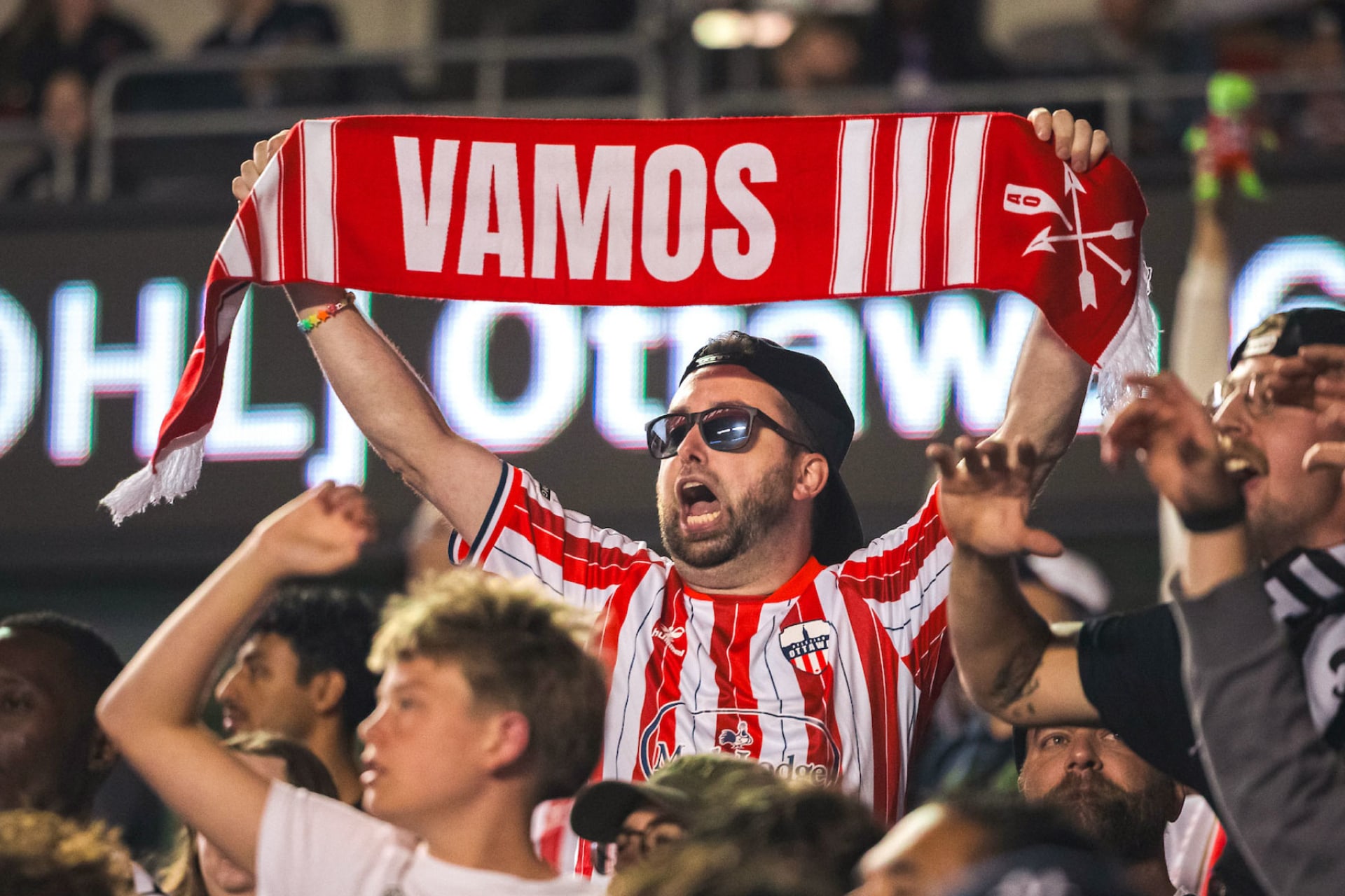 Adult cheering in the crowd